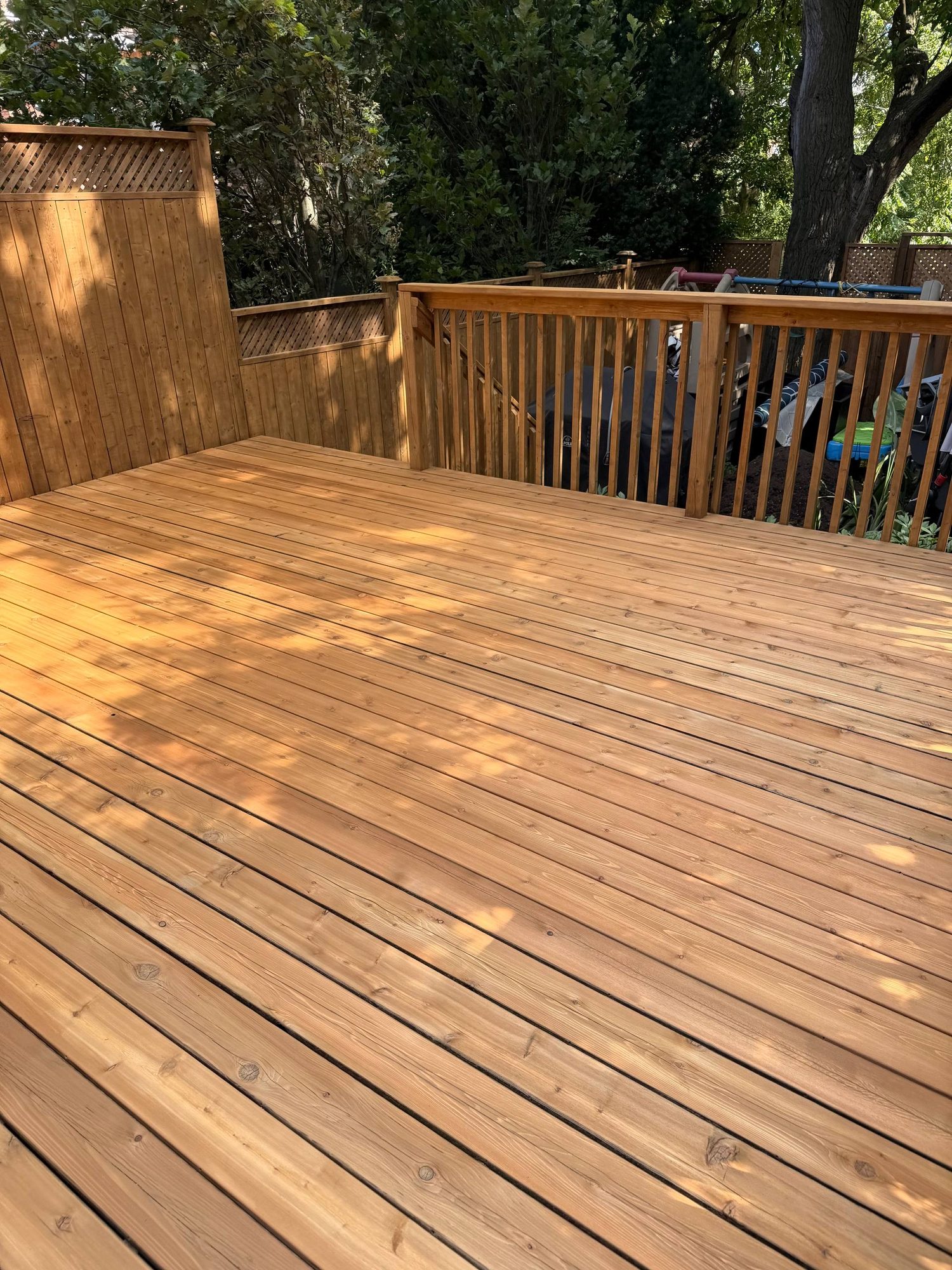 Cedar Deck Restoration in Toronto — 16 Boards Replaced, Sanded and Stained in Toronto